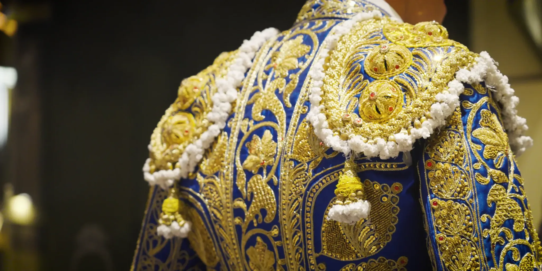 Blue and gold traje de luces detail